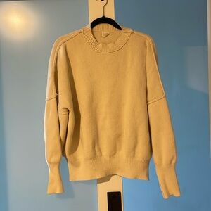 Cream sweater, size large